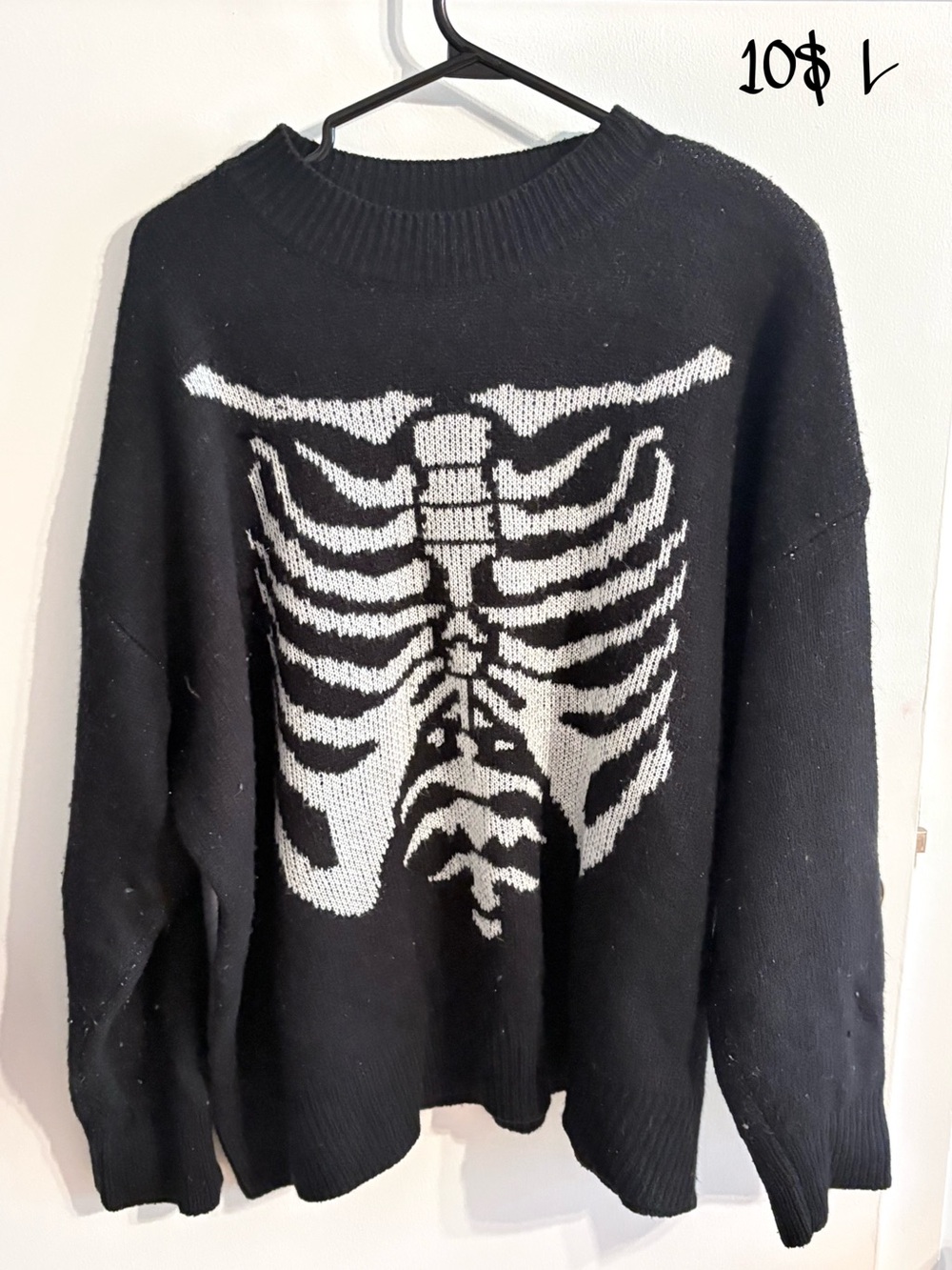 Black Sweater with White Skeleton Ribcage Graphic